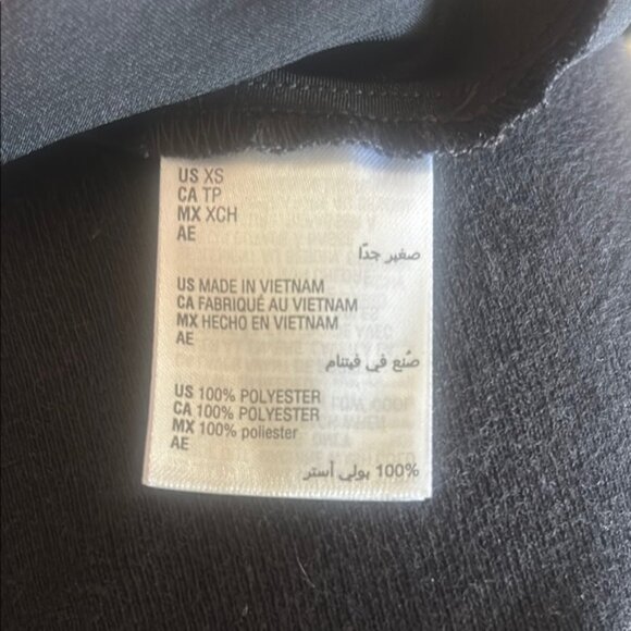 And Now This Black Silky Chemise with Spaghetti Straps and Flared Hem - Picture 2 of 3